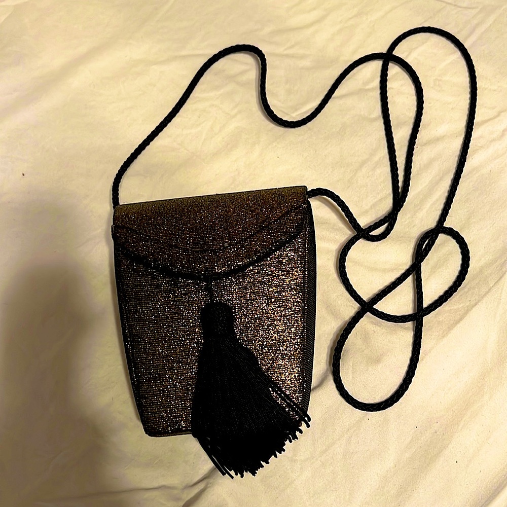 Elegant Gold and black sparkly evening bag with black tassel.